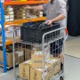 Compact folding roll cage trolley. 2-sided with base shelf